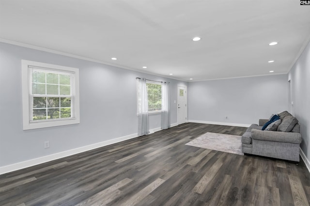 3619 Hanson Ave, Columbia, SC 29204 - unfurnished living room featuring ornamental molding, recessed lighting, and dark wood-style flooring