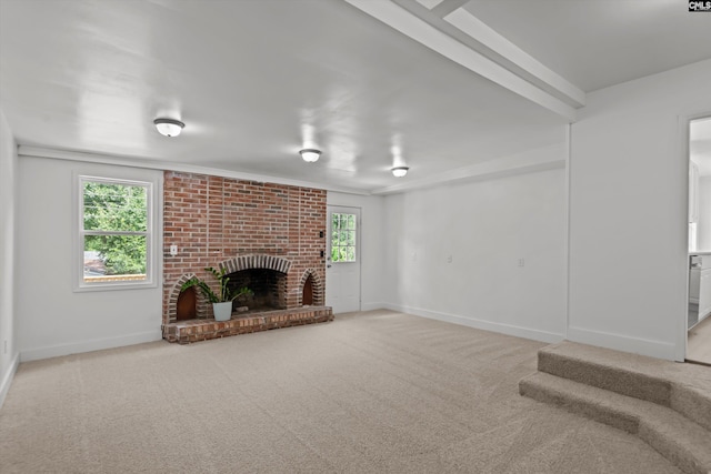 4405 Palmetto Ave, Columbia, SC 29203 - unfurnished living room featuring carpet floors and a brick fireplace