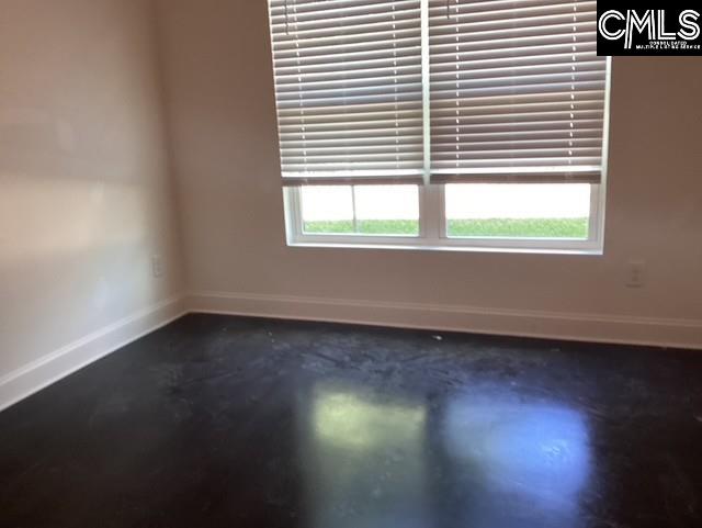 610 C Ave, West Columbia, SC 29169 - unfurnished room with finished concrete flooring and baseboards