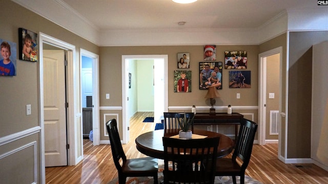 2367 Mount Pilgrim Church Rd, Prosperity, SC 29127 - dining space featuring light wood-style floors and crown molding