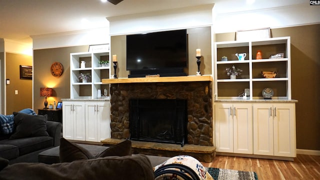 2367 Mount Pilgrim Church Rd, Prosperity, SC 29127 - living room with crown molding, light wood-type flooring, and a fireplace
