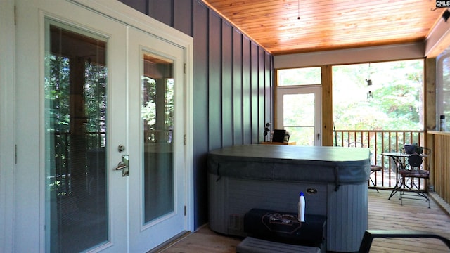 2367 Mount Pilgrim Church Rd, Prosperity, SC 29127 - sunroom / solarium with healthy amount of natural light, a hot tub, and french doors