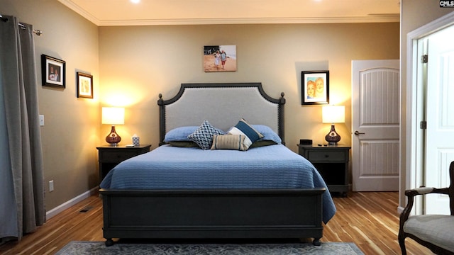 2367 Mount Pilgrim Church Rd, Prosperity, SC 29127 - bedroom with crown molding and wood finished floors