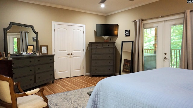 2367 Mount Pilgrim Church Rd, Prosperity, SC 29127 - bedroom featuring access to exterior, wood finished floors, crown molding, multiple windows, and recessed lighting