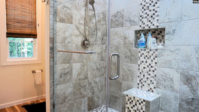 2367 Mount Pilgrim Church Rd, Prosperity, SC 29127 - bathroom featuring a stall shower and wood finished floors