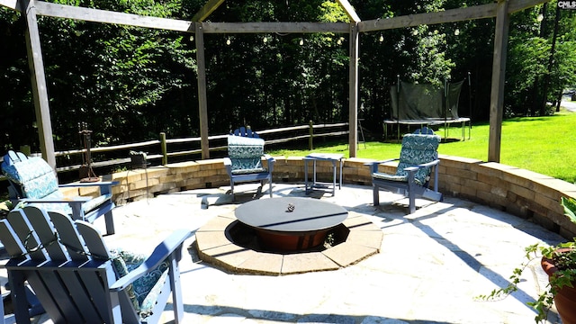2367 Mount Pilgrim Church Rd, Prosperity, SC 29127 - view of patio with an outdoor fire pit and a trampoline