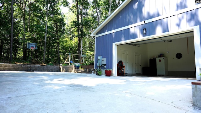 2367 Mount Pilgrim Church Rd, Prosperity, SC 29127 - view of side of home with a garage and board and batten siding