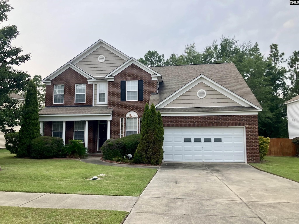 117 Vineyards Crossing Ct, Columbia, SC 29229 - view of front of home with brick siding, concrete driveway, roof with shingles, and an attached garage