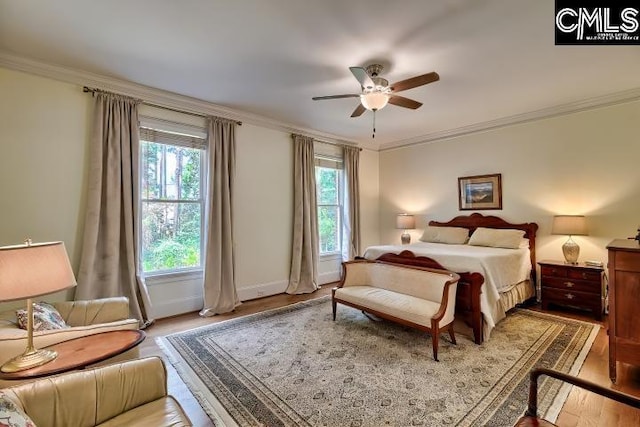 426 Turkey Point Cir, Columbia, SC 29223 - bedroom featuring wood finished floors, crown molding, and ceiling fan
