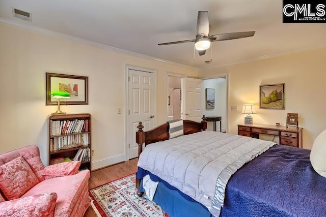 426 Turkey Point Cir, Columbia, SC 29223 - bedroom featuring crown molding, light wood-type flooring, and a ceiling fan