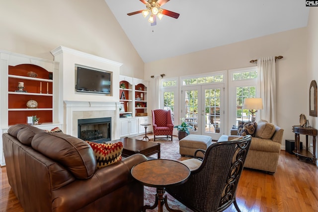 132 Alston Cir, Lexington, SC 29072 - living area with high vaulted ceiling, ceiling fan, a fireplace, wood finished floors, and built in shelves