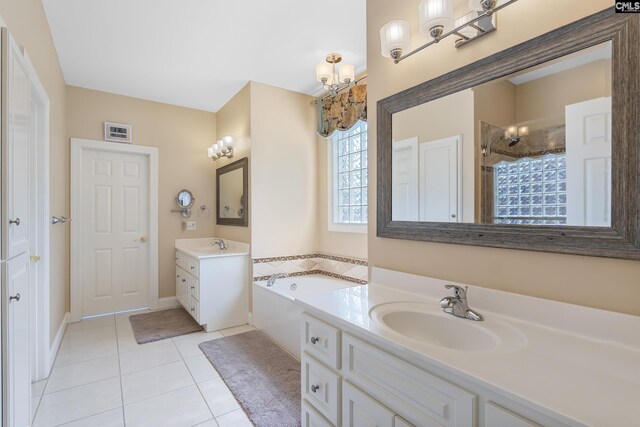 132 Alston Cir, Lexington, SC 29072 - full bathroom with two vanities, a garden tub, tile patterned floors, and a shower