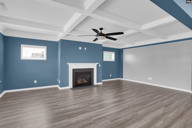4040 Summerland Way, Elgin, SC 29045 - unfurnished living room featuring coffered ceiling, ceiling fan, beam ceiling, a fireplace with flush hearth, and wood finished floors