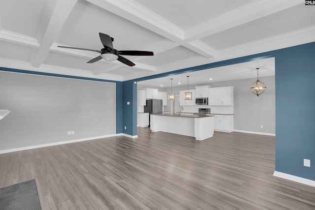 4040 Summerland Way, Elgin, SC 29045 - unfurnished living room featuring coffered ceiling, beamed ceiling, dark wood-style flooring, recessed lighting, and a ceiling fan