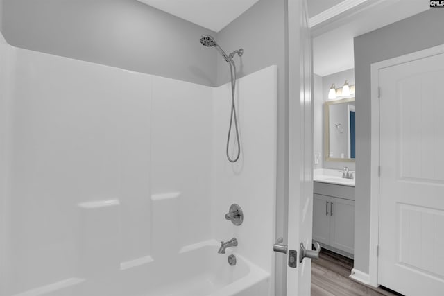 4040 Summerland Way, Elgin, SC 29045 - full bath with tub / shower combination, wood finished floors, and vanity