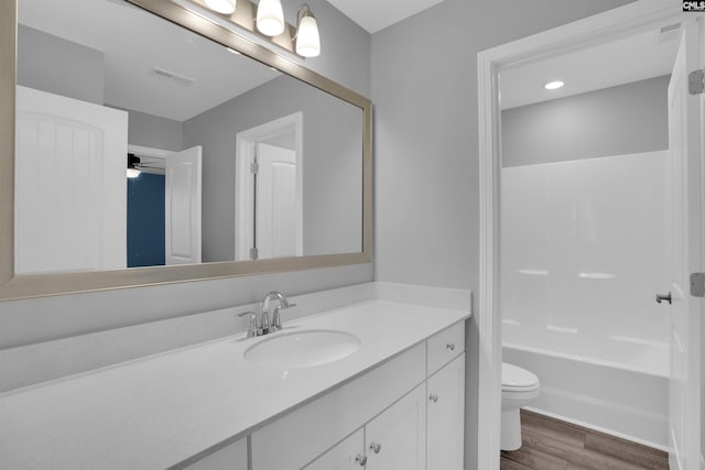 4040 Summerland Way, Elgin, SC 29045 - bathroom featuring vanity, wood finished floors, and bathing tub / shower combination