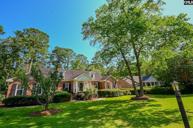 77 Olde Springs Rd, Columbia, SC 29223 - view of front of house featuring brick siding and a front lawn