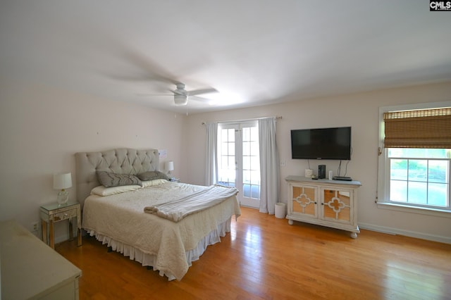 77 Olde Springs Rd, Columbia, SC 29223 - bedroom with multiple windows, light wood finished floors, and ceiling fan