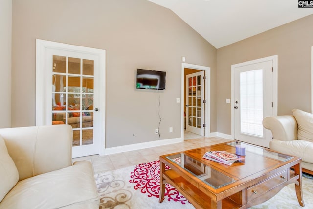 487 Marsh Pointe Dr, Columbia, SC 29229 - living room featuring vaulted ceiling and light tile patterned flooring
