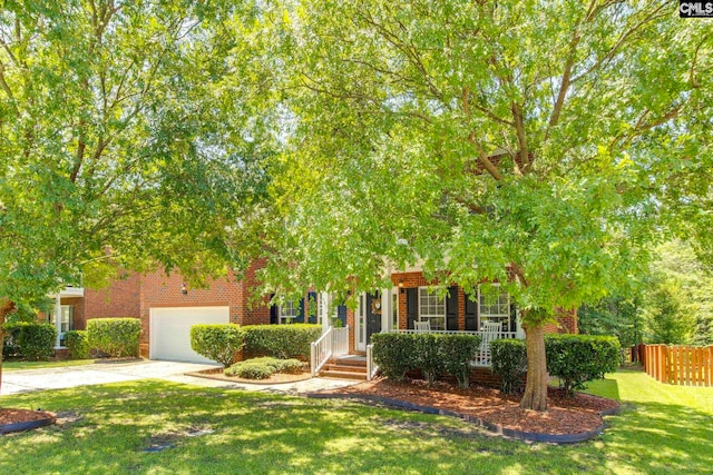 487 Marsh Pointe Dr, Columbia, SC 29229 - obstructed view of property featuring brick siding, concrete driveway, a garage, and covered porch