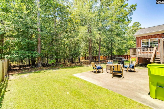 487 Marsh Pointe Dr, Columbia, SC 29229 - fenced backyard with a patio, a deck, and outdoor dining area