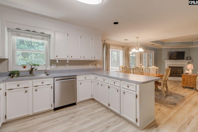 112 Pebble Place Ct, Lexington, SC 29072 - kitchen with stainless steel dishwasher, crown molding, a chandelier, light wood-style floors, and white cabinets