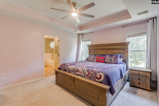 112 Pebble Place Ct, Lexington, SC 29072 - bedroom featuring crown molding, carpet flooring, ensuite bathroom, ceiling fan, and a tray ceiling