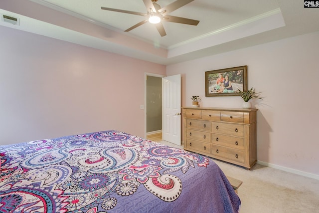 112 Pebble Place Ct, Lexington, SC 29072 - bedroom with crown molding, a tray ceiling, light carpet, and ceiling fan