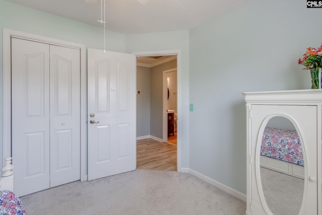 112 Pebble Place Ct, Lexington, SC 29072 - unfurnished bedroom featuring carpet floors, a closet, and crown molding