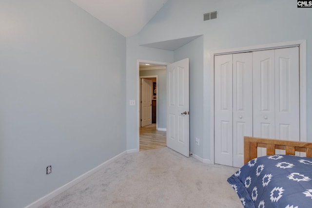 112 Pebble Place Ct, Lexington, SC 29072 - bedroom with light colored carpet, a closet, and high vaulted ceiling
