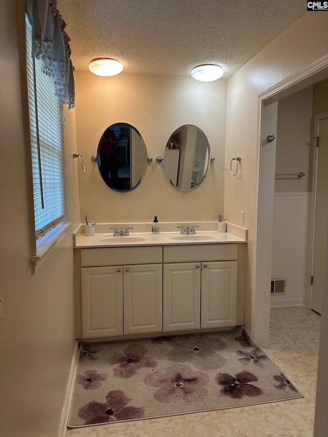 2324 Morningside Dr, West Columbia, SC 29169 - full bath with a textured ceiling and double vanity