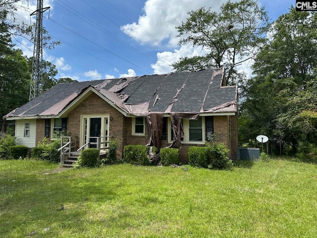 2601 Myrtle St, Newberry, SC 29108 - view of front of house with brick siding and a front lawn