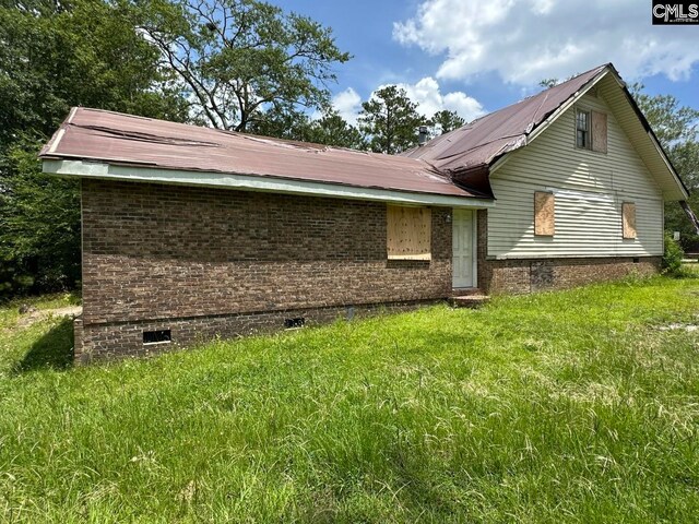 2601 Myrtle St, Newberry, SC 29108 - rear view of house with crawl space and brick siding