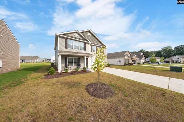 2416 Newberry Landing Cir, Newberry, SC 29108 - traditional-style home with concrete driveway, a residential view, and a front yard