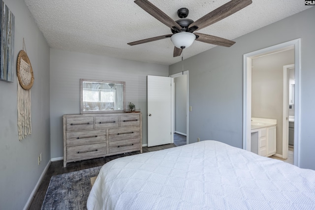 1426 B Ave, West Columbia, SC 29169 - bedroom featuring wood finished floors, a textured ceiling, a ceiling fan, and ensuite bath