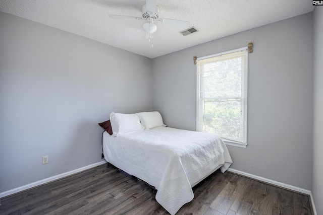 1426 B Ave, West Columbia, SC 29169 - bedroom with wood finished floors, a textured ceiling, and ceiling fan