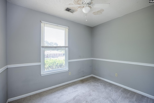 1426 B Ave, West Columbia, SC 29169 - empty room featuring carpet floors, a ceiling fan, and a textured ceiling