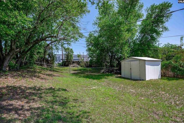 1426 B Ave, West Columbia, SC 29169 - fenced backyard with a storage unit