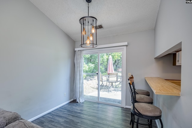 1426 B Ave, West Columbia, SC 29169 - dining space featuring a textured ceiling and wood finished floors