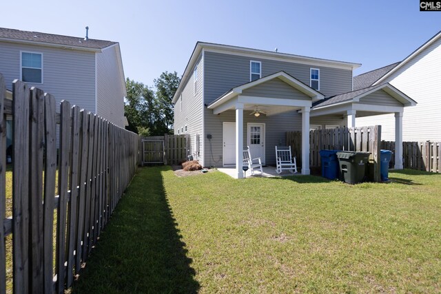 116 Silver Run Pl, West Columbia, SC 29169 - rear view of house featuring a ceiling fan, a patio, a fenced backyard, and a gate