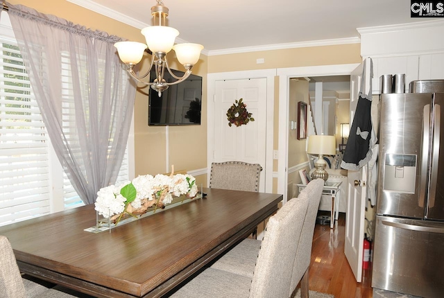 5 Eastpine Ct, Columbia, SC 29212 - dining room with a chandelier, crown molding, and wood finished floors