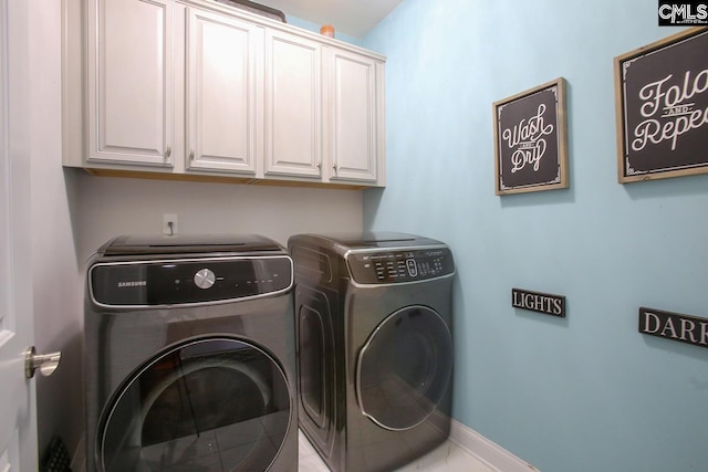 576 Maple Valley Loop, Blythewood, SC 29016 - laundry area with washer and clothes dryer, cabinet space, and tile patterned floors