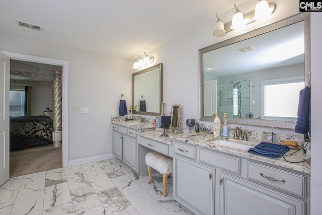 576 Maple Valley Loop, Blythewood, SC 29016 - ensuite bathroom with double vanity, marble finish floors, and a shower with door
