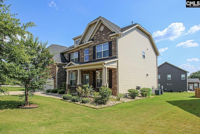 576 Maple Valley Loop, Blythewood, SC 29016 - view of side of property featuring brick siding and a lawn