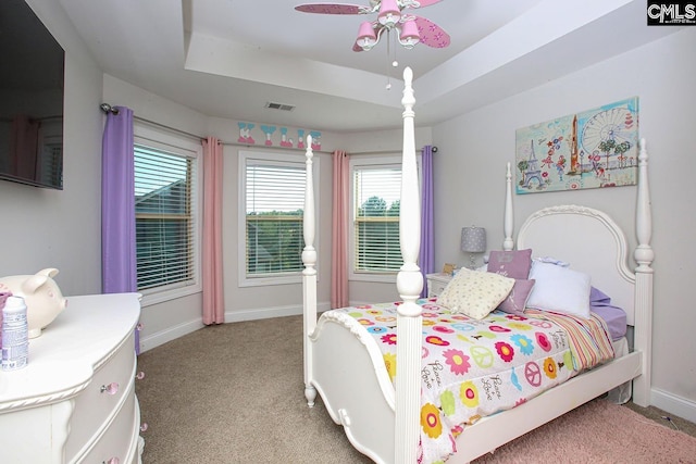 576 Maple Valley Loop, Blythewood, SC 29016 - bedroom featuring light colored carpet, a raised ceiling, and a ceiling fan