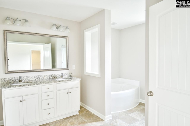 608 Cheehaw Ave, West Columbia, SC 29170 - bathroom featuring double vanity and a garden tub