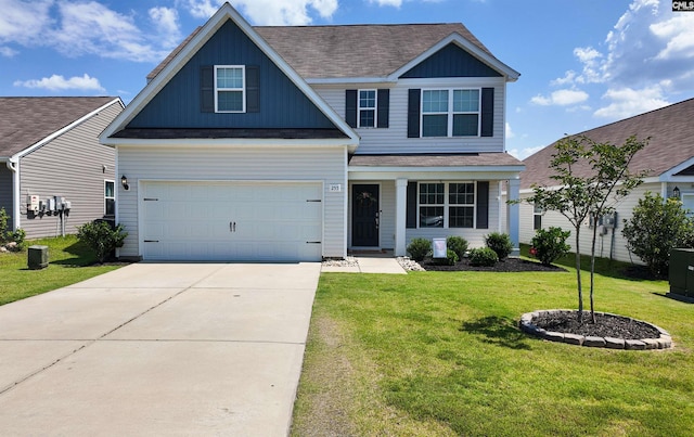255 Common Reed Dr, Gilbert, SC 29054 - traditional home with driveway, board and batten siding, a front yard, and a shingled roof