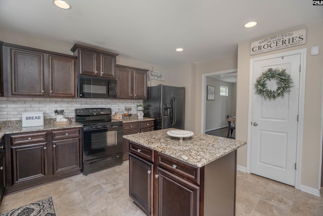 611 Colony Lakes Dr, Lexington, SC 29073 - kitchen featuring black appliances, backsplash, light stone counters, dark brown cabinets, and recessed lighting