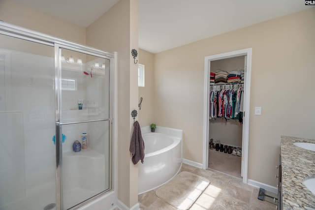 611 Colony Lakes Dr, Lexington, SC 29073 - full bath featuring a shower stall, a garden tub, vanity, and a walk in closet