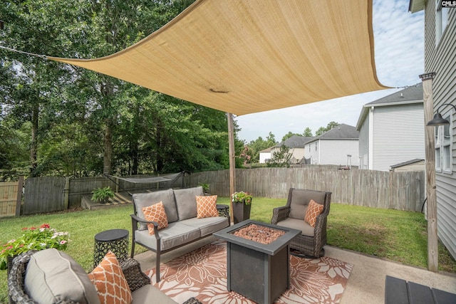 611 Colony Lakes Dr, Lexington, SC 29073 - fenced backyard featuring an outdoor living space with a fire pit and a patio area